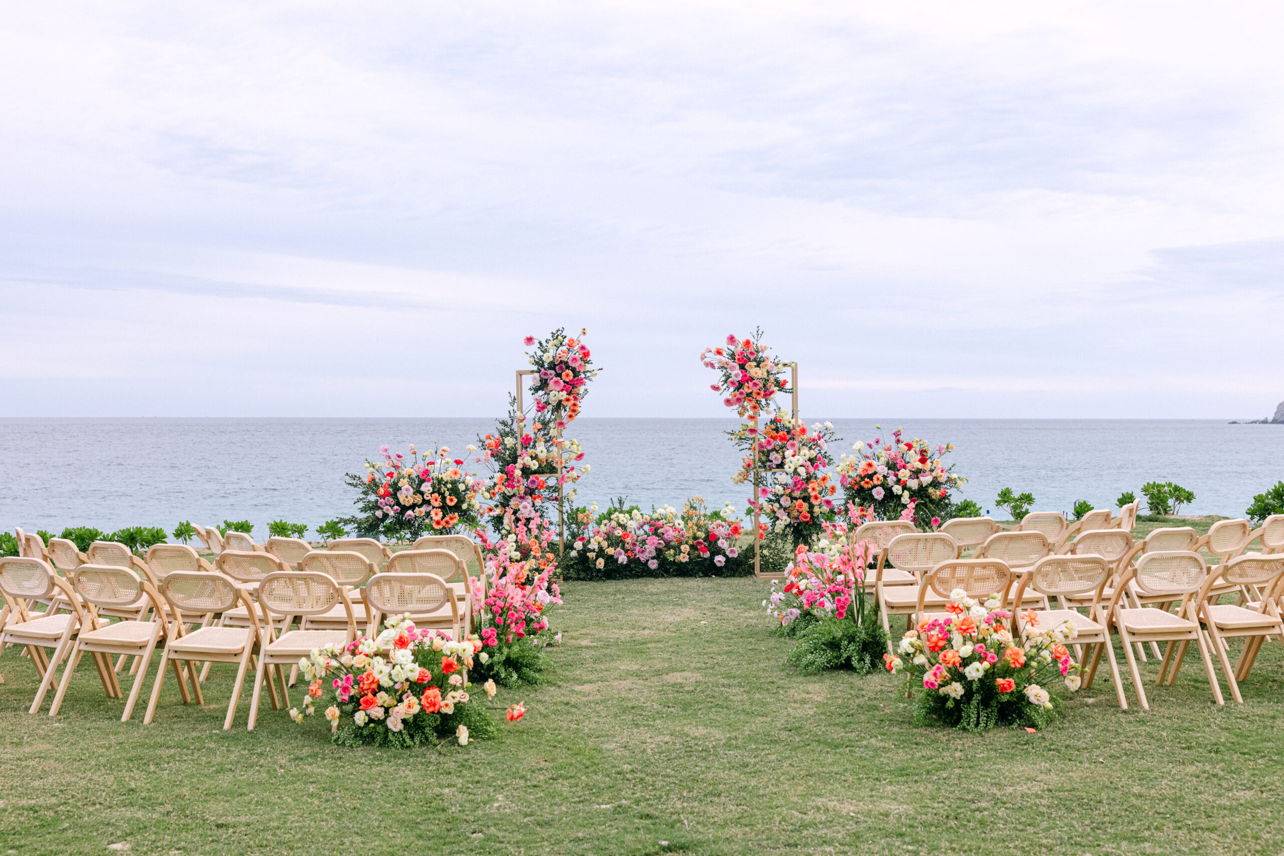 Park Hyatt Los Cabos wedding setup with floral arch and seating facing the ocean.