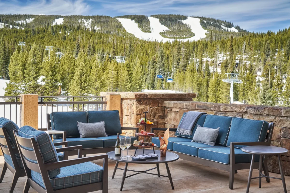 Outdoor seating area at Montage Big Sky with mountain views; perfect for a Montana wedding venue.