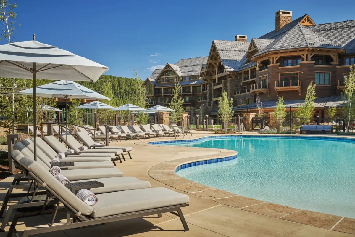 Resort pool and lounge chairs at Montage Big Sky, a Montana wedding venue.