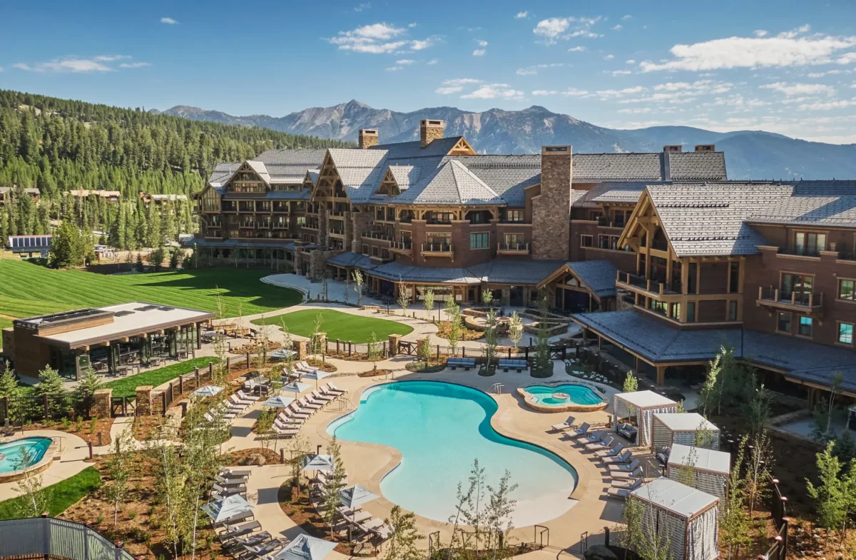 Montage Big Sky resort in Montana, featuring a pool and mountain views. A perfect Montana wedding venue.