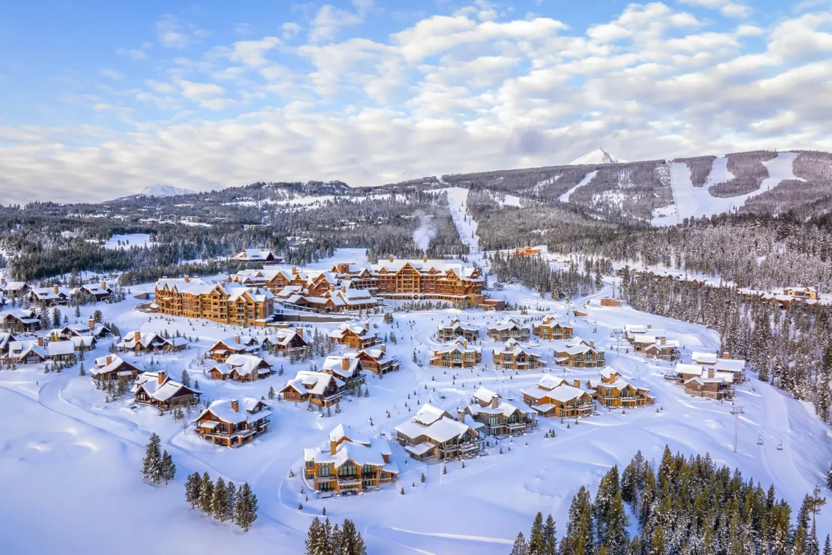 Aerial view of Montage Big Sky resort covered in snow, a Montana wedding venue.