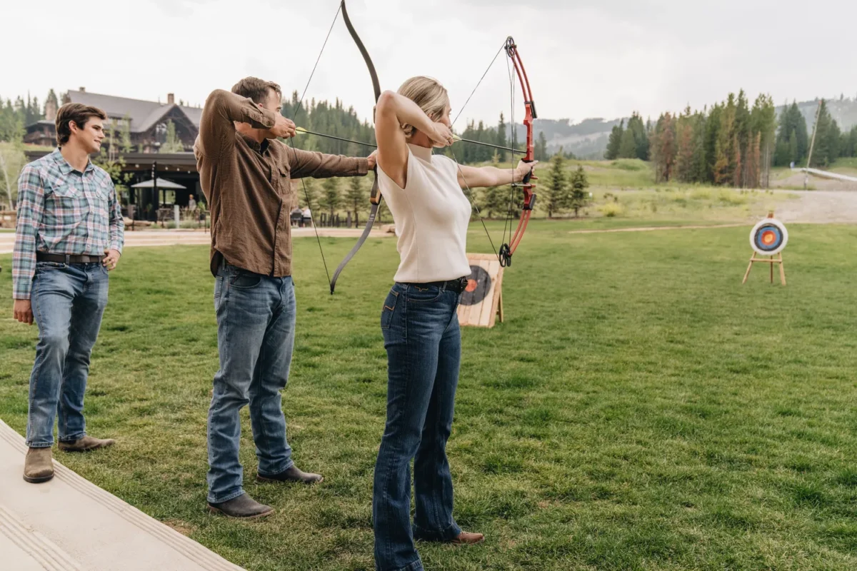People practicing archery at a Montana wedding venue, Montage Big Sky.