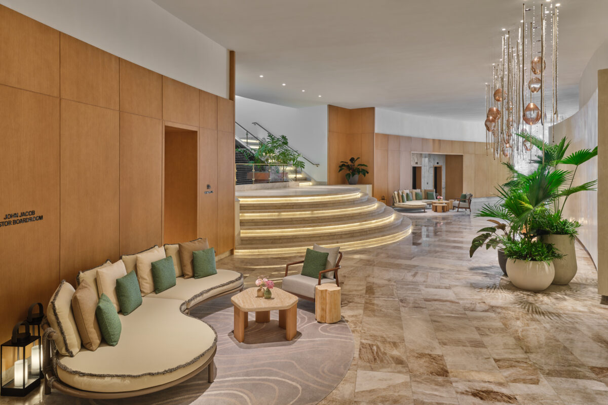 St. Regis Cap Cana resort lobby with elegant seating and staircase.