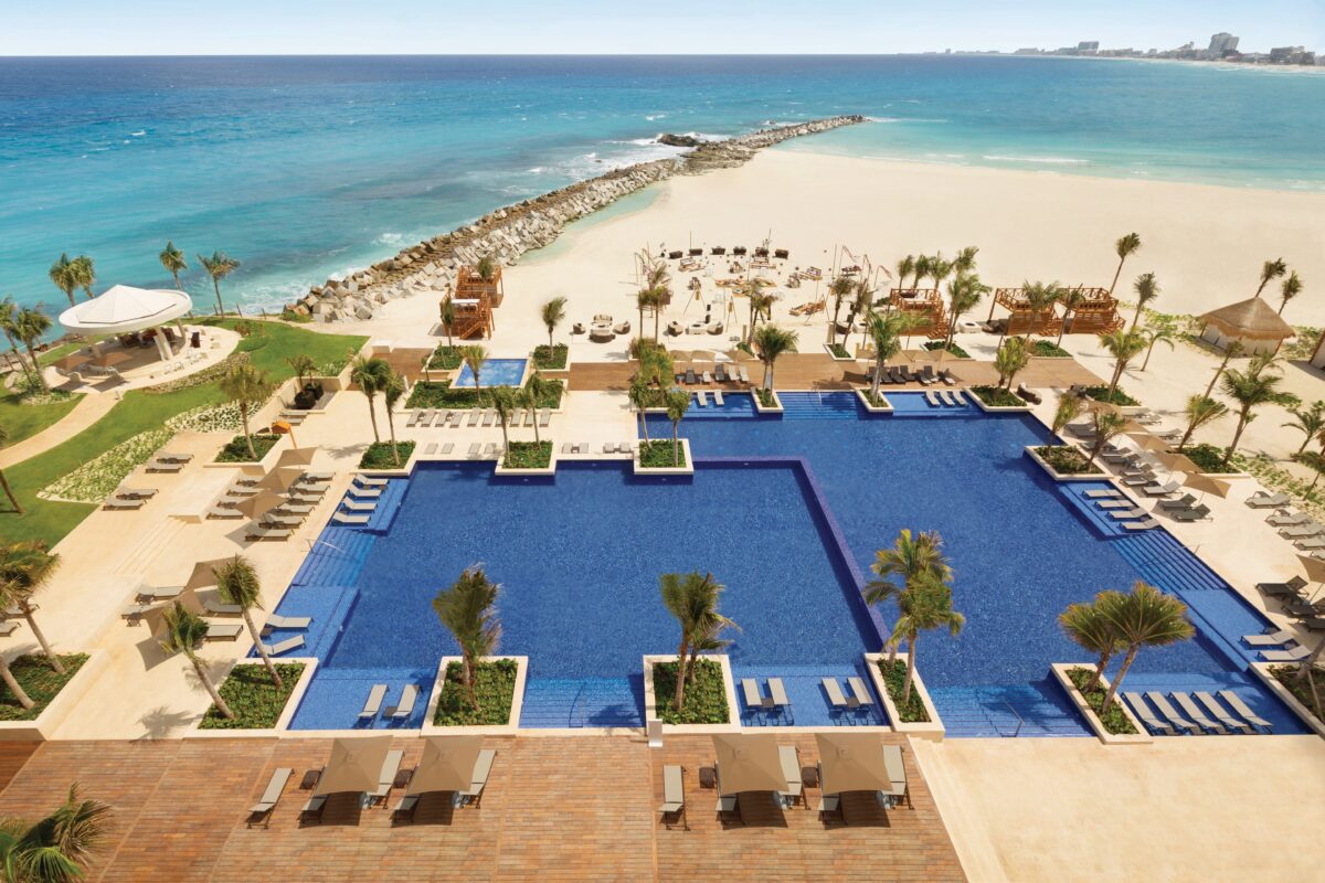 Hyatt Ziva Cancún: Aerial view of the resort's pool and beach, a luxury wedding venue.