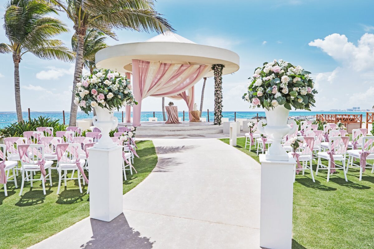 Cancun luxury wedding venue with ocean view and elegant gazebo.