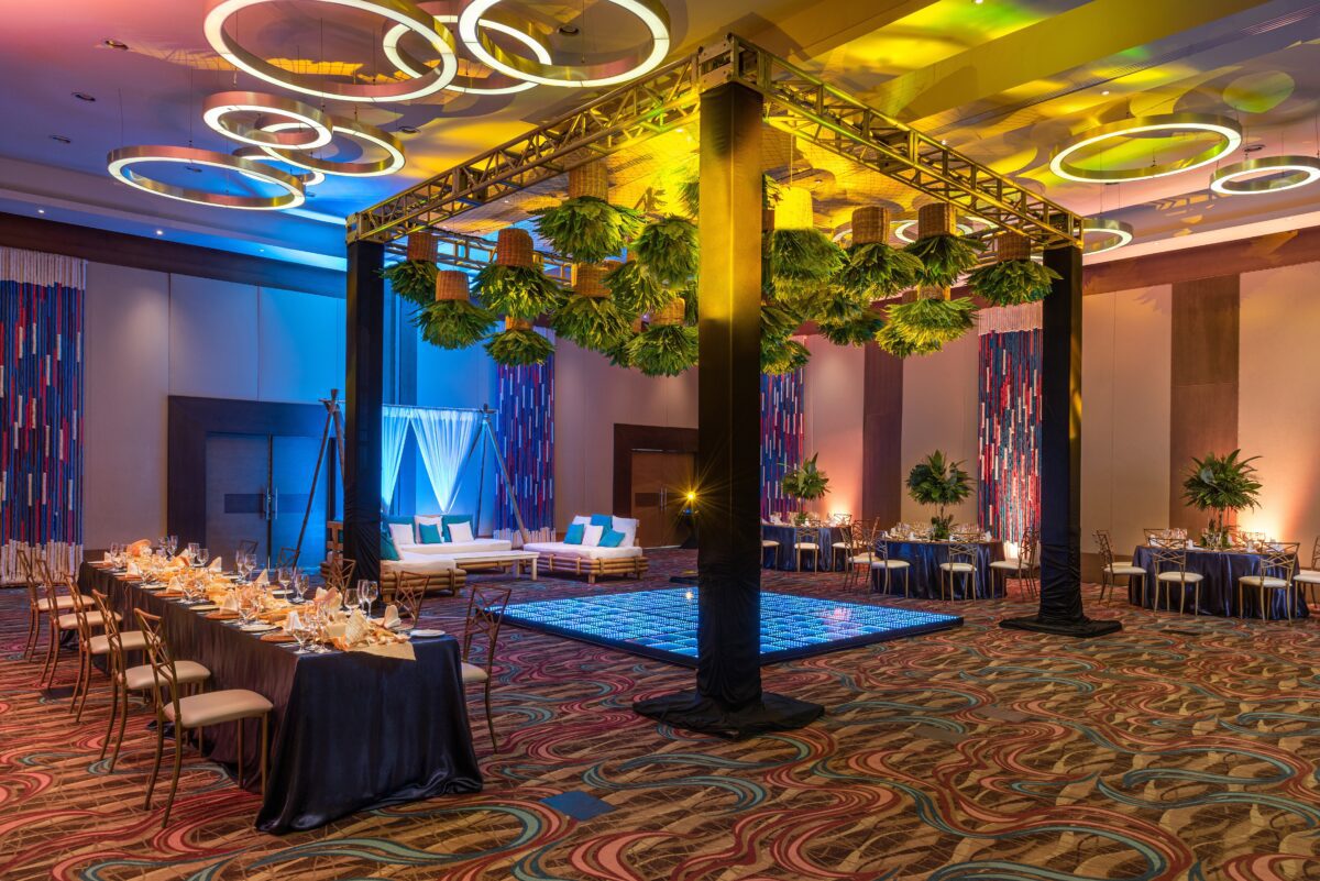 Hyatt Ziva Cancún wedding venue with a decorated dance floor and tables.