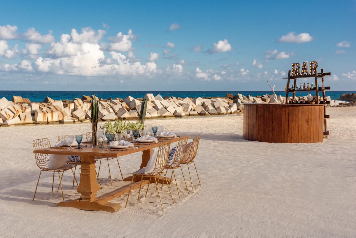 Beach wedding reception setup at Hyatt Ziva Cancún, a luxury wedding venue in Cancun.