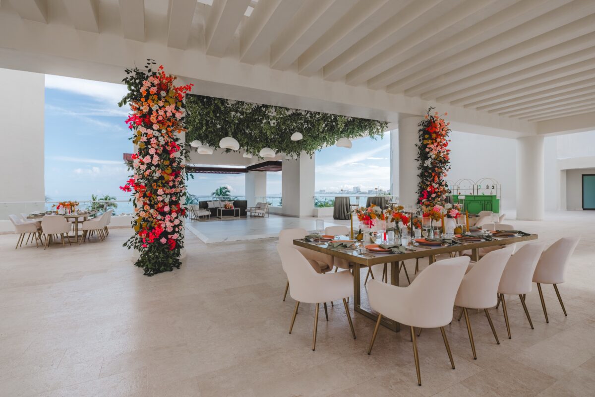 Luxury wedding venue in Cancun: Elegant reception at Hyatt Ziva Cancún with floral decor and ocean view.