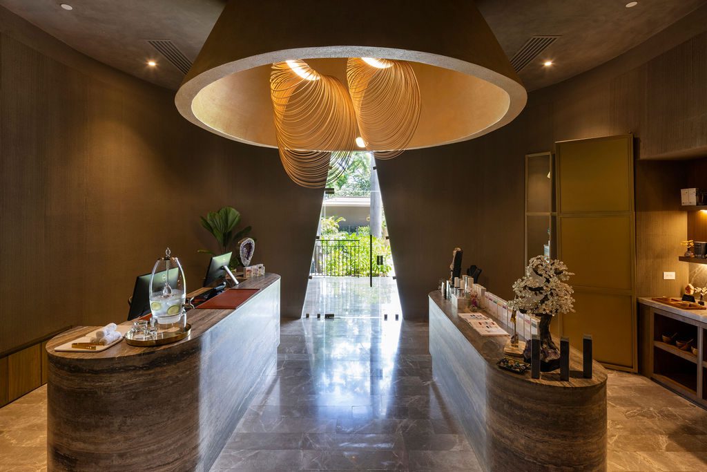 Waldorf Astoria Costa Rica spa reception area with elegant lighting and design.