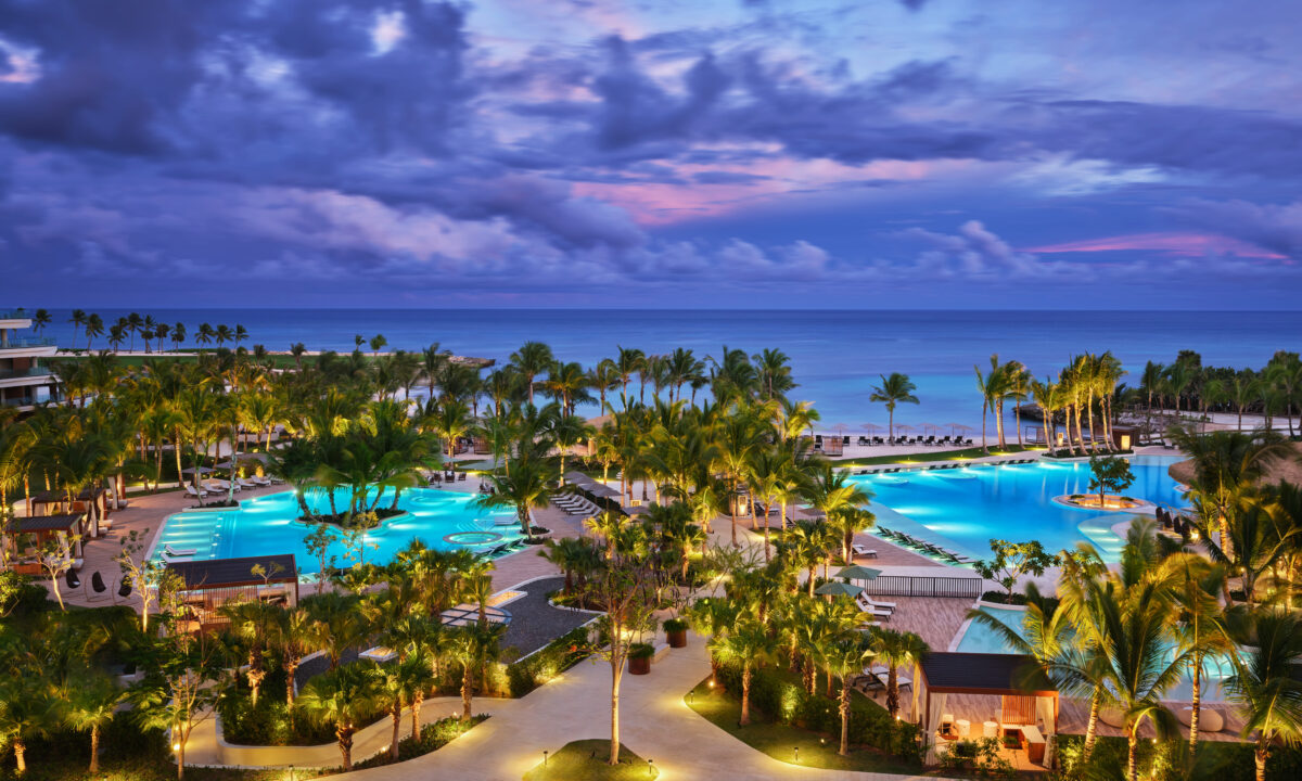Luxury St. Regis Cap Cana resort pools at dusk, an exclusive wedding resort in Punta Cana.