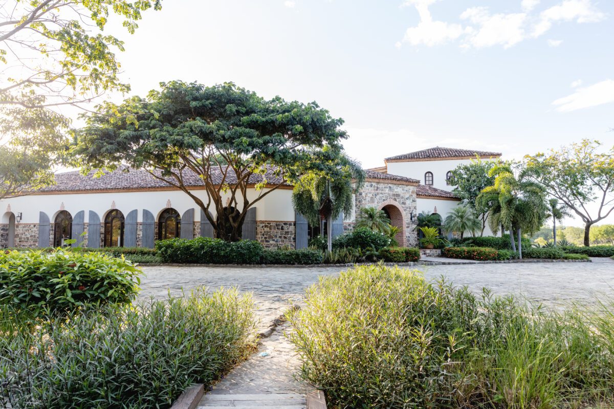 Ranch-style villa surrounded by lush greenery at Rancho Santana