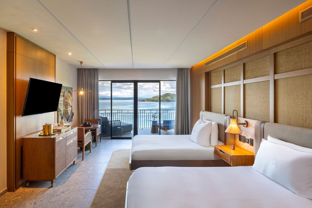 Waldorf Astoria Costa Rica room with two beds and ocean view from the balcony.