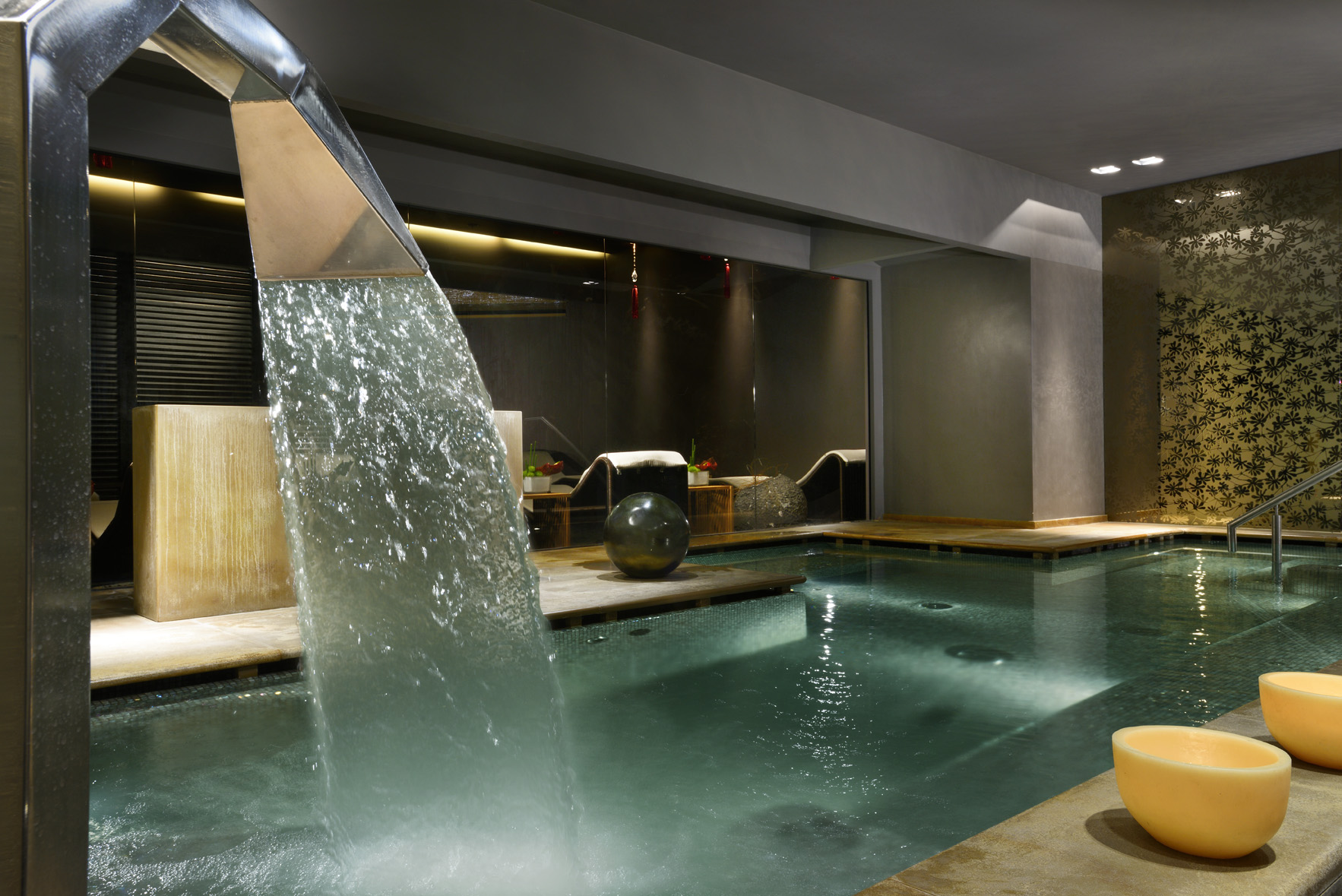 Indoor pool with waterfall feature at Royal Hotel Sanremo, Italy.