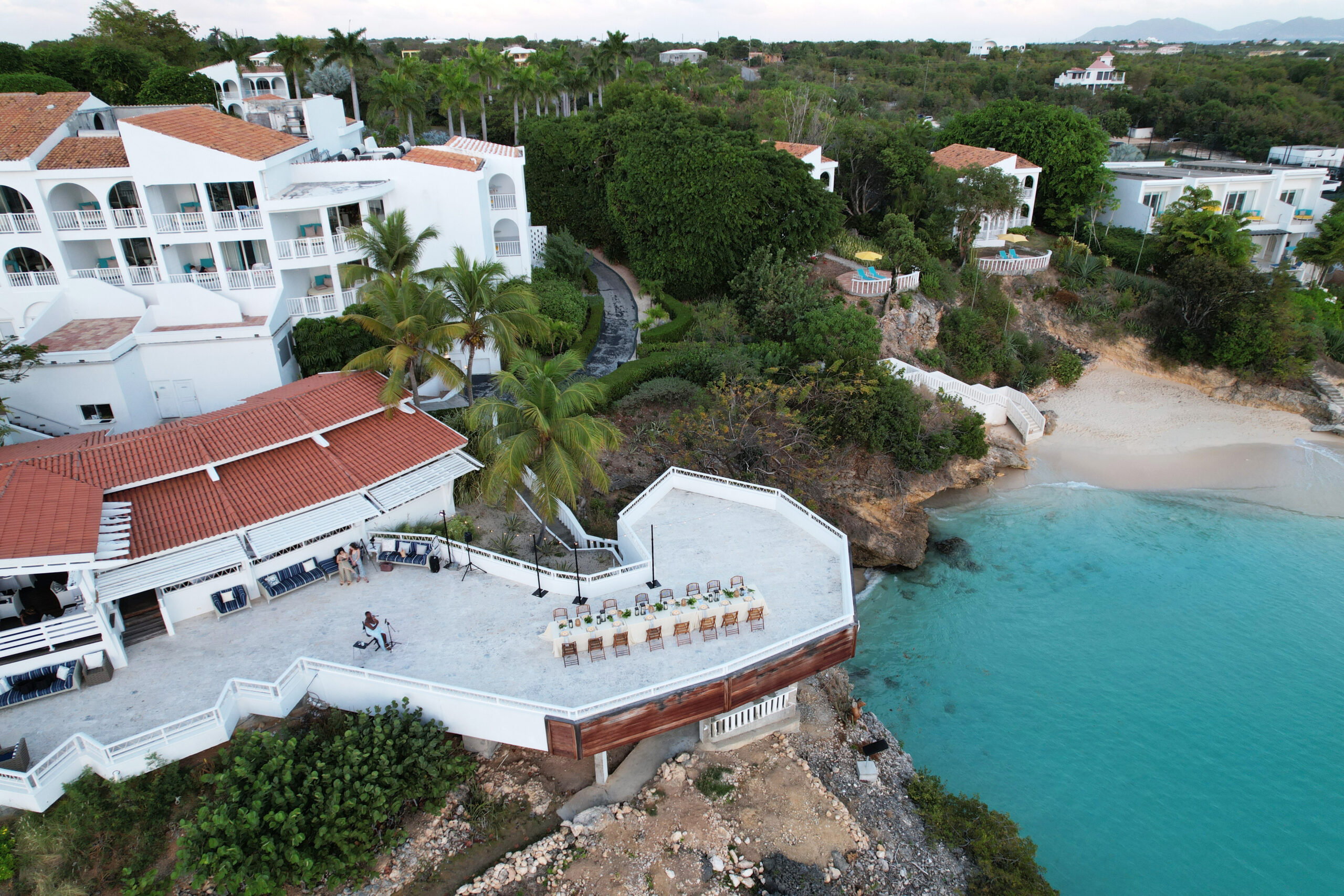 Malliouhana resort terrace overlooking turquoise water, Anguilla.