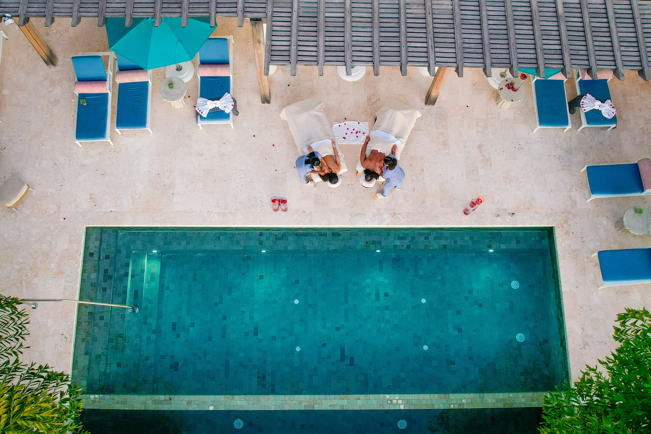 Malliouhana resort pool area with couples getting massages.