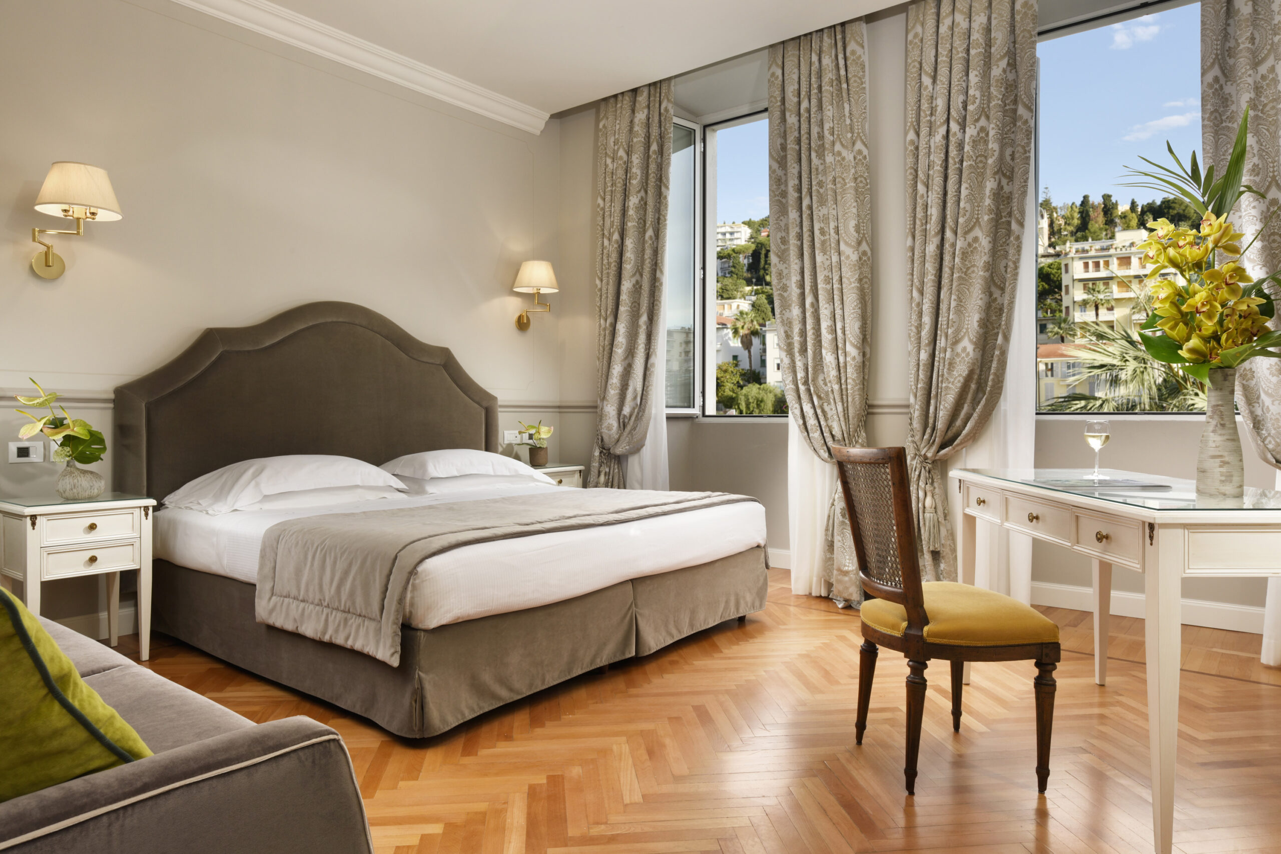 Luxury hotel room at Royal Hotel Sanremo with a view, perfect as a wedding venue.