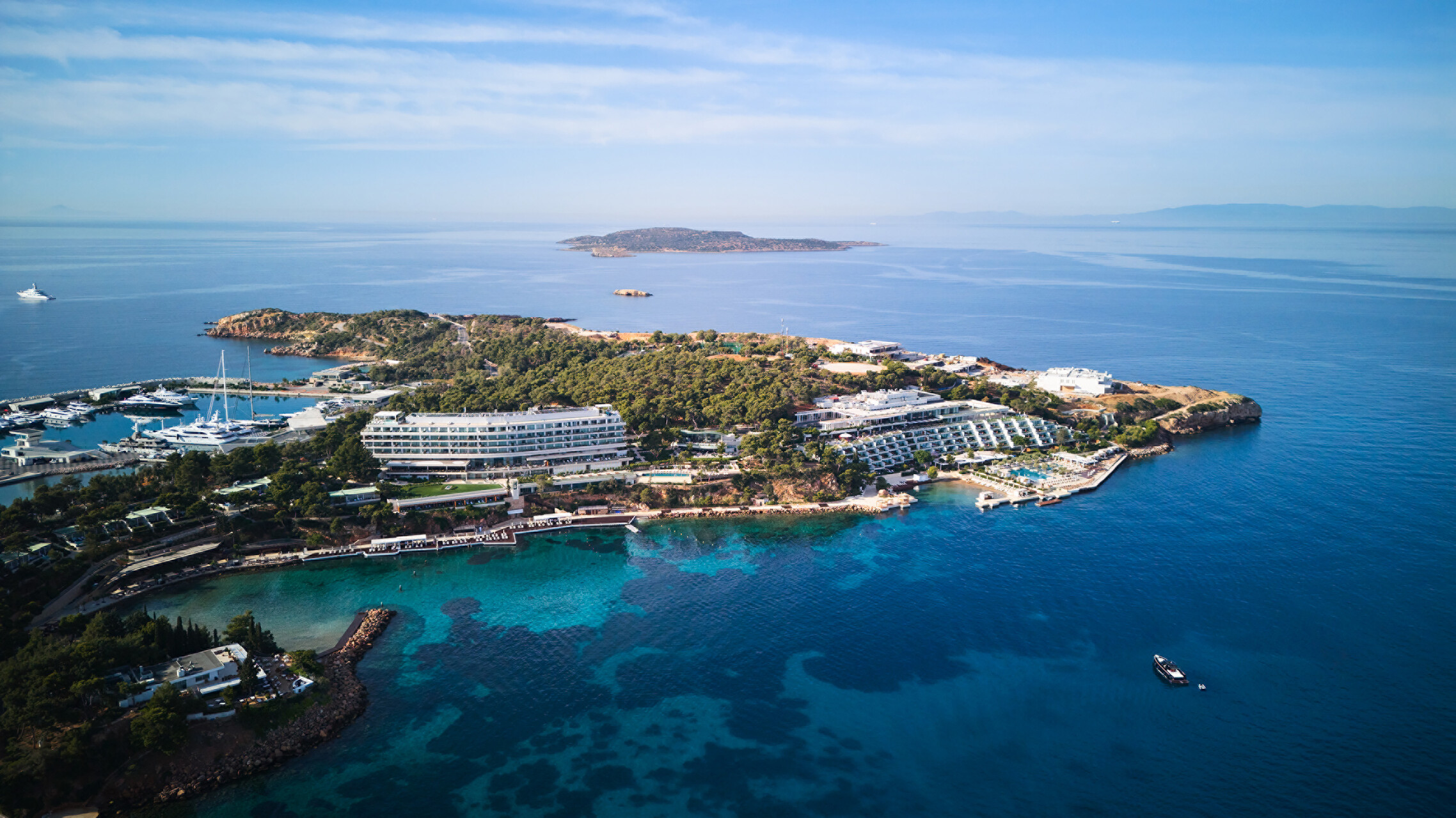 Aerial view of the Four Seasons Astir Palace Hotel Athens on a peninsula.