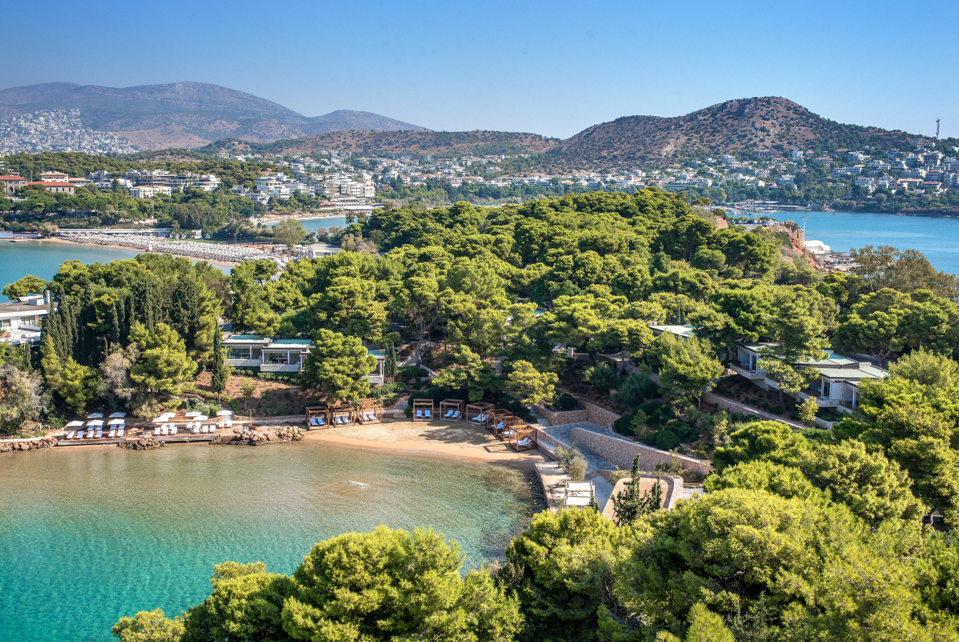 Four Seasons Astir Palace Hotel Athens: Aerial view of the resort's beach and turquoise waters.