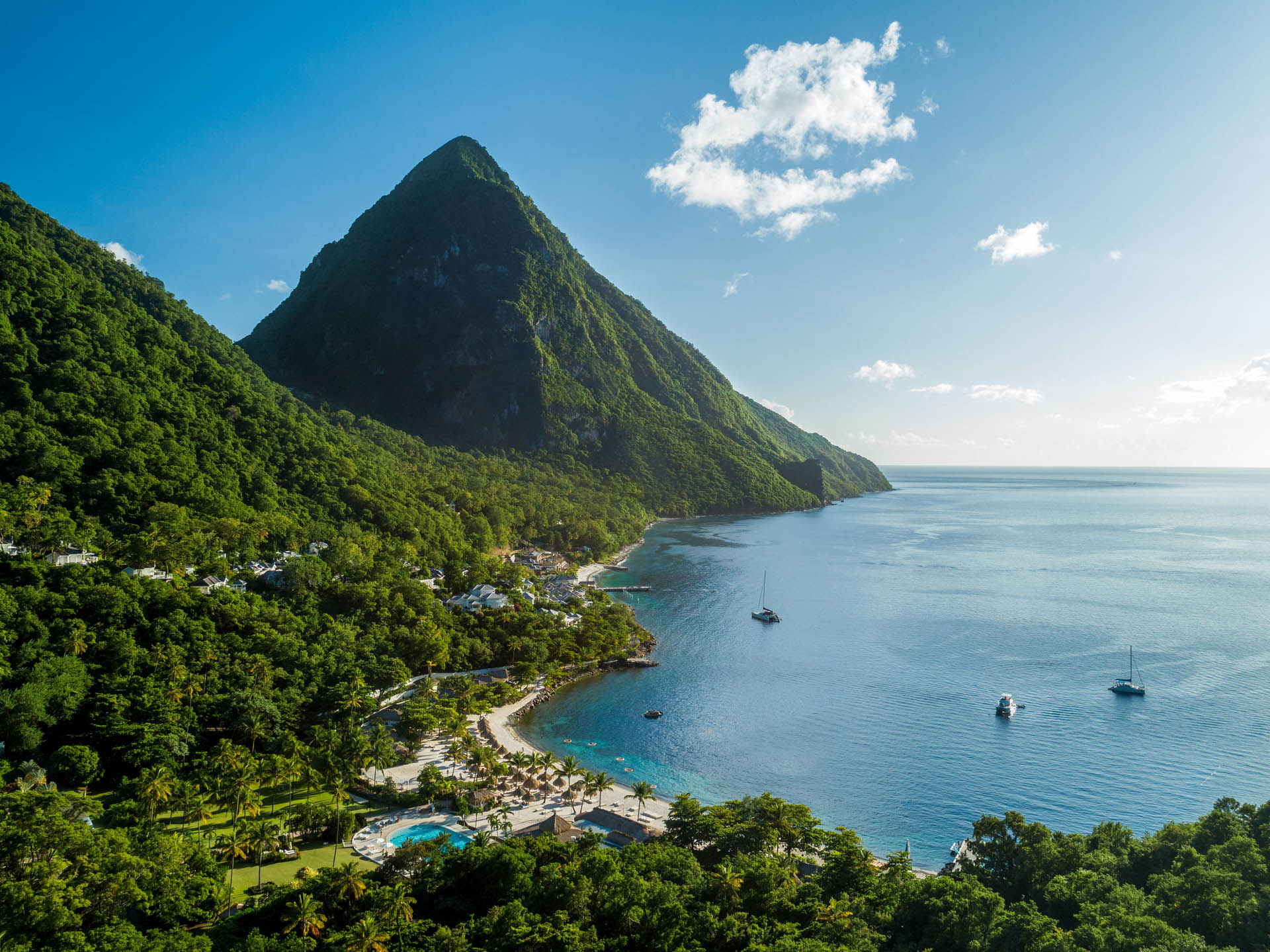 Lush Caribbean resort with Pitons backdrop, a stunning venue for best Caribbean destination weddings.