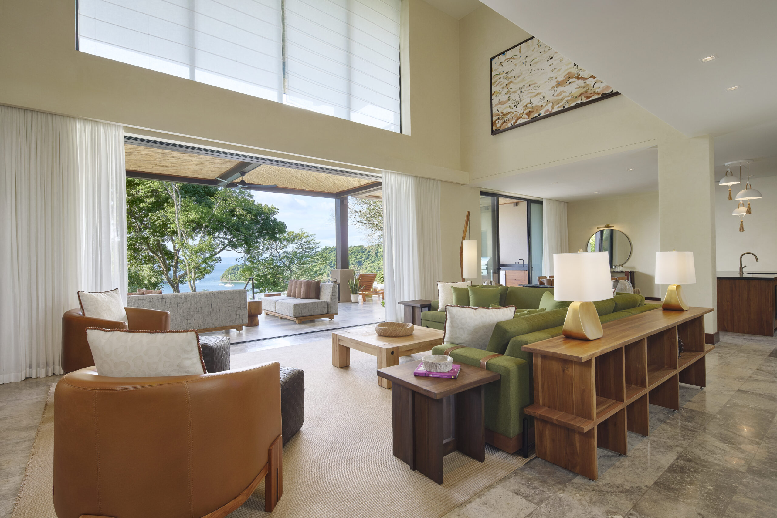 Luxurious living room at Nekajui, a Ritz Carlton Reserve, with ocean view.