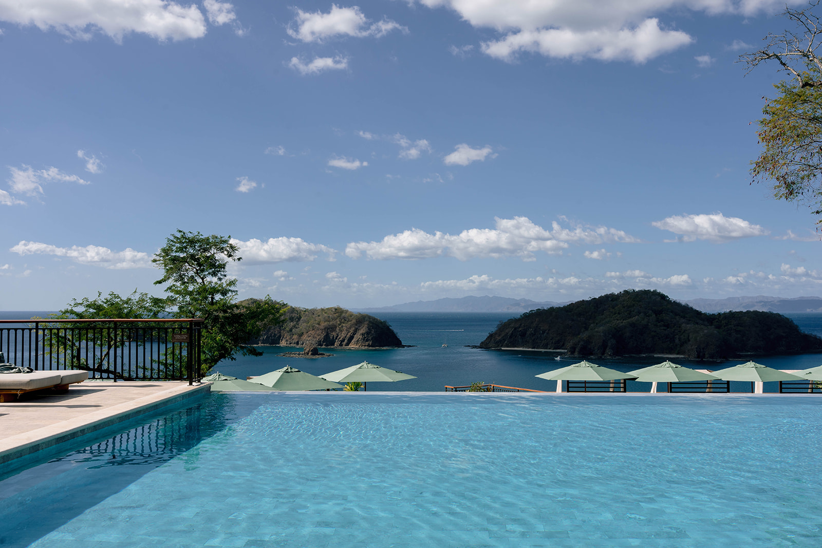 Nekajui Ritz Carlton Reserve infinity pool overlooking ocean and islands