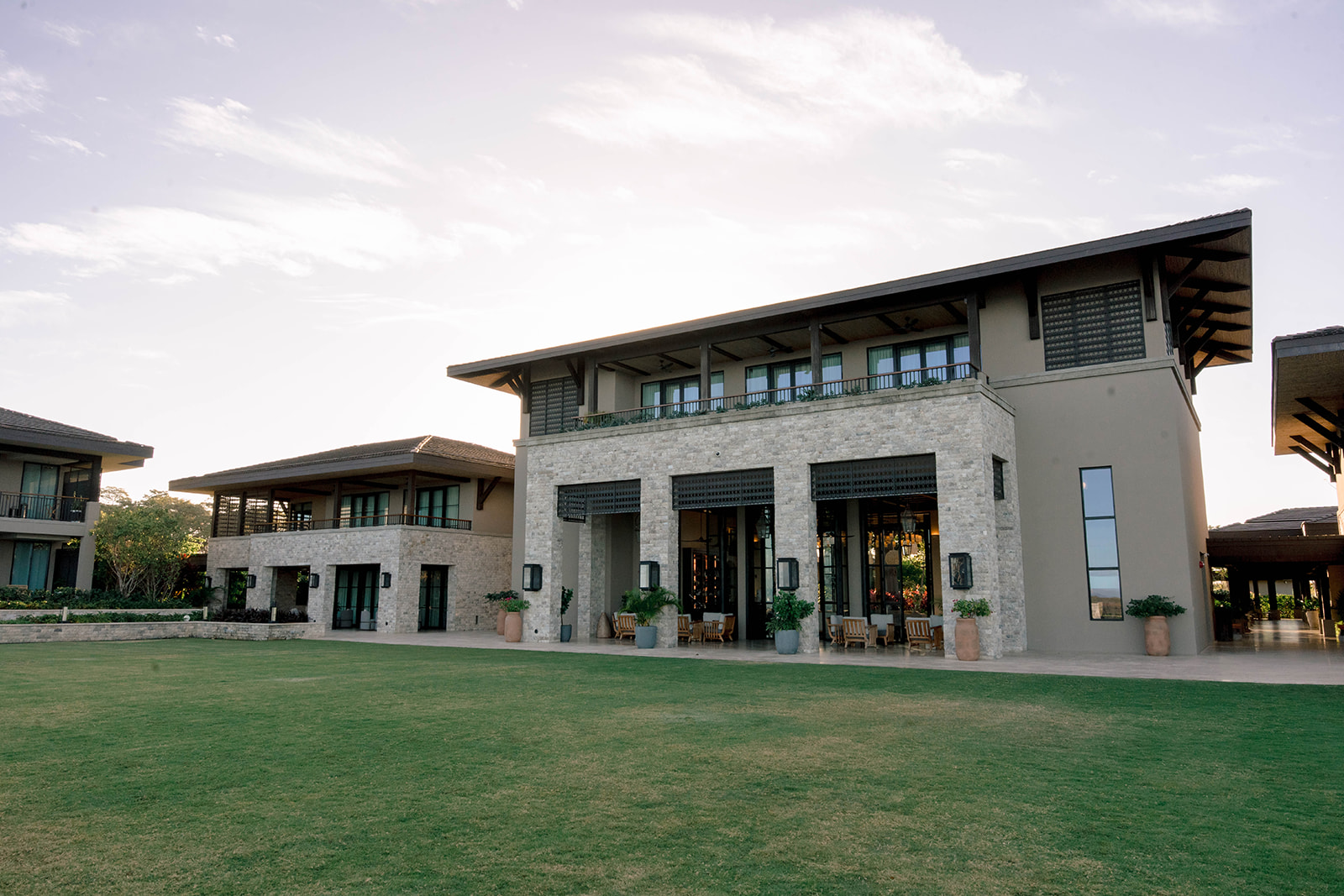 Nekajui Ritz Carlton Reserve architecture and manicured lawn.