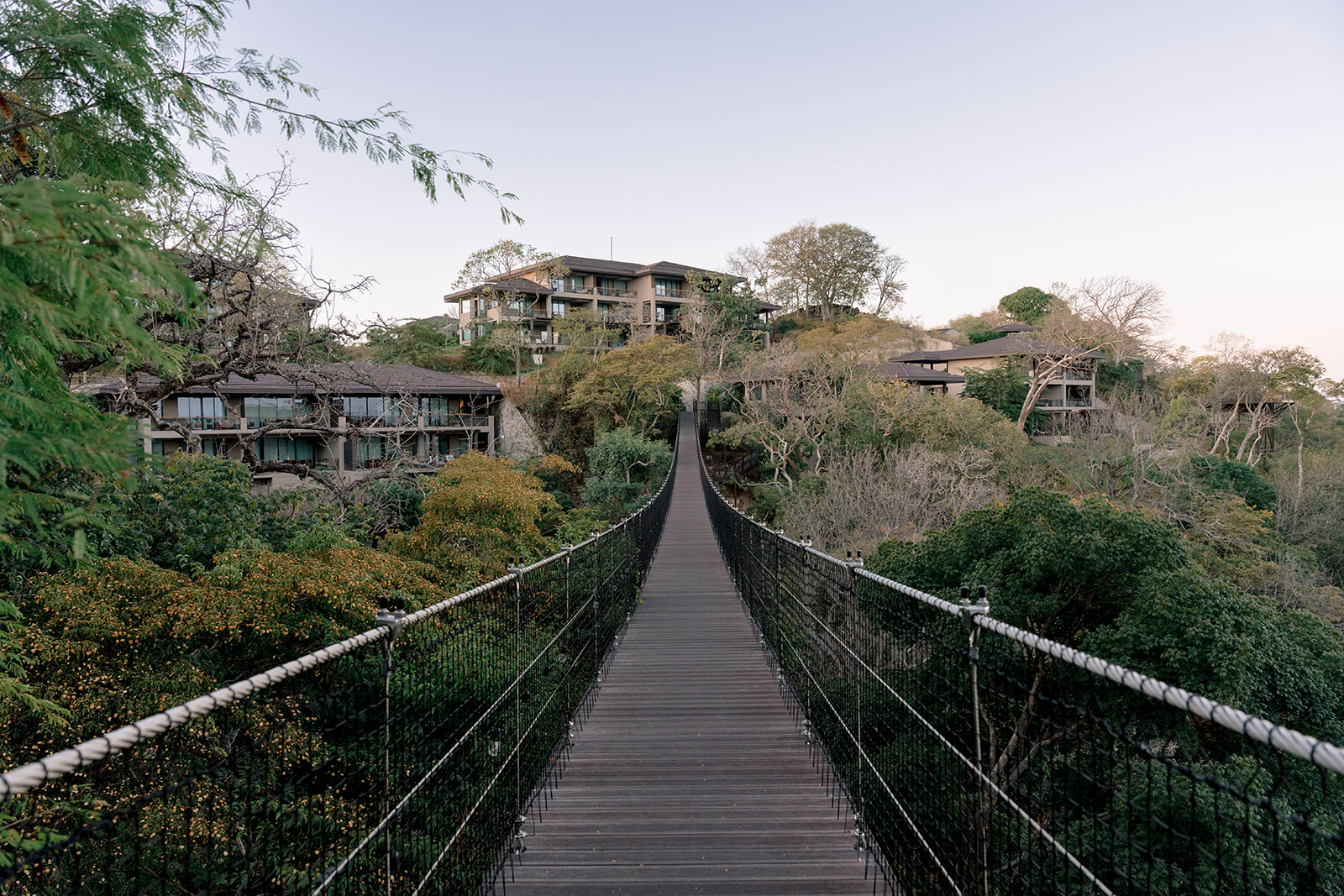 Suspension bridge at Nekajui, a Ritz Carlton Reserve, connecting luxury villas.