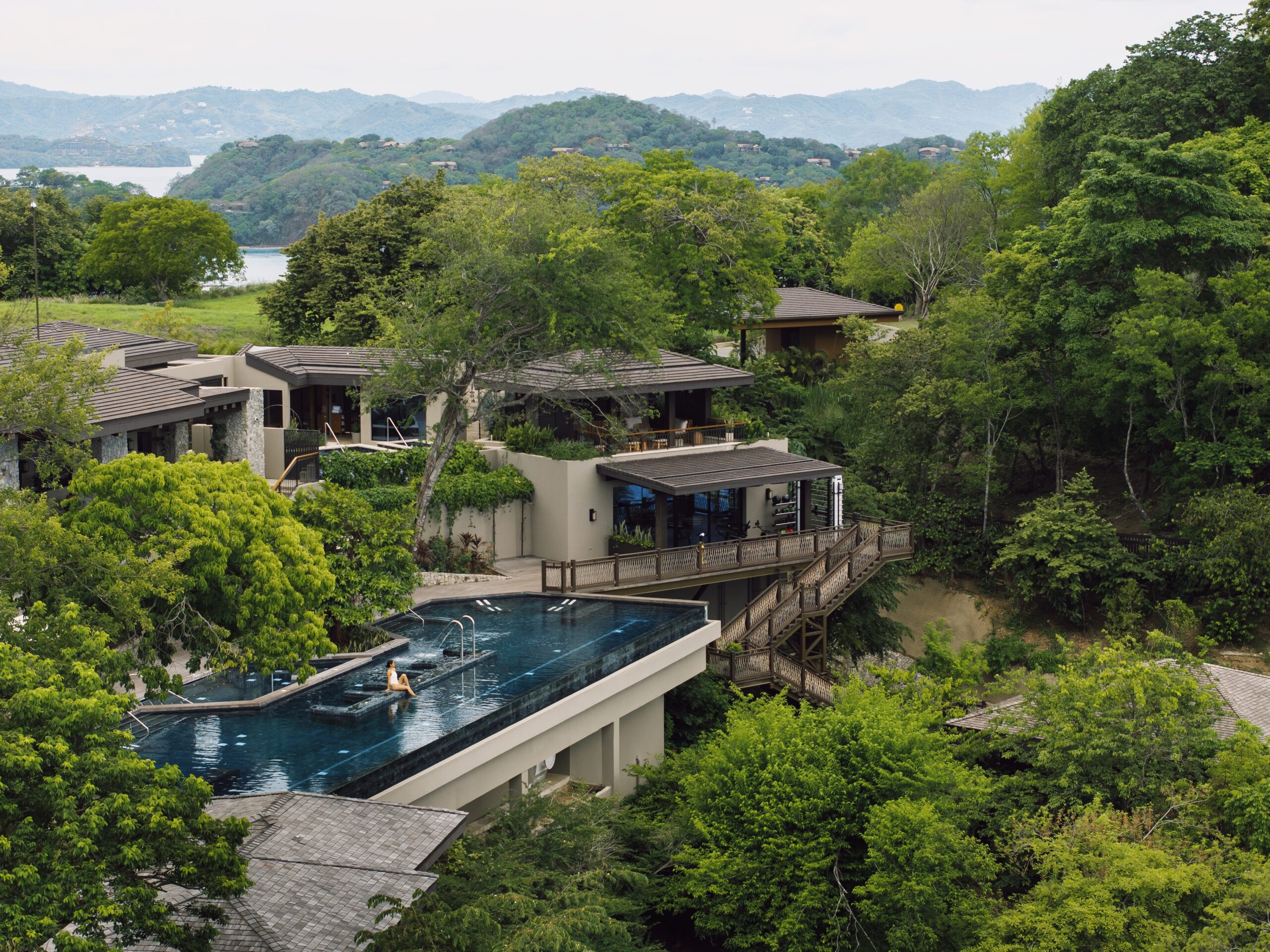 Luxury resort with infinity pool at Nekajui, a Ritz Carlton Reserve. Perfect wedding venue in Costa Rica.