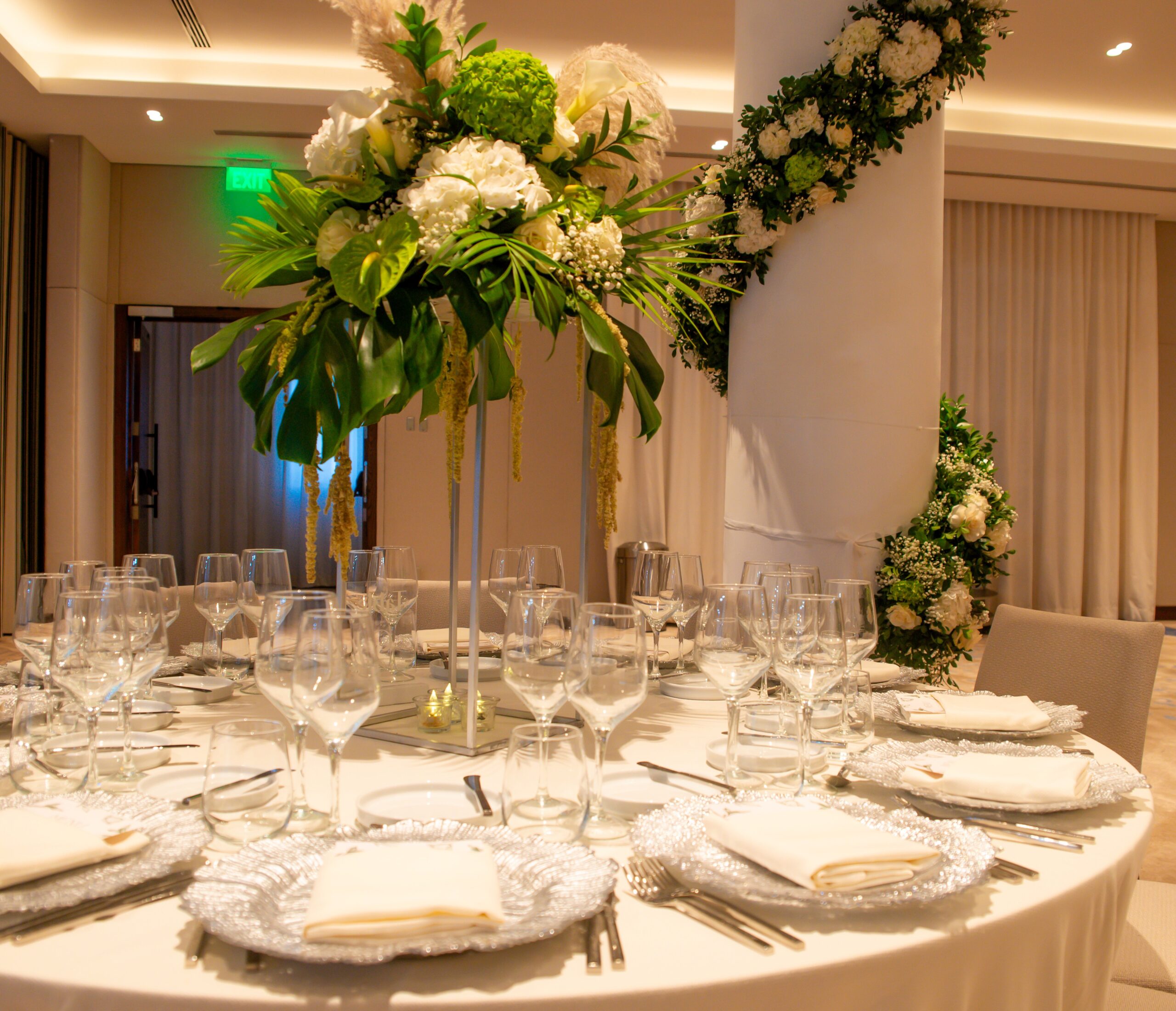 Elegant wedding table setting with floral centerpiece at W Punta Cana.