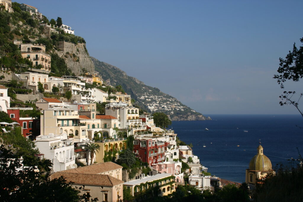 Positano, Italy, with colorful villas cascading down to the sea.