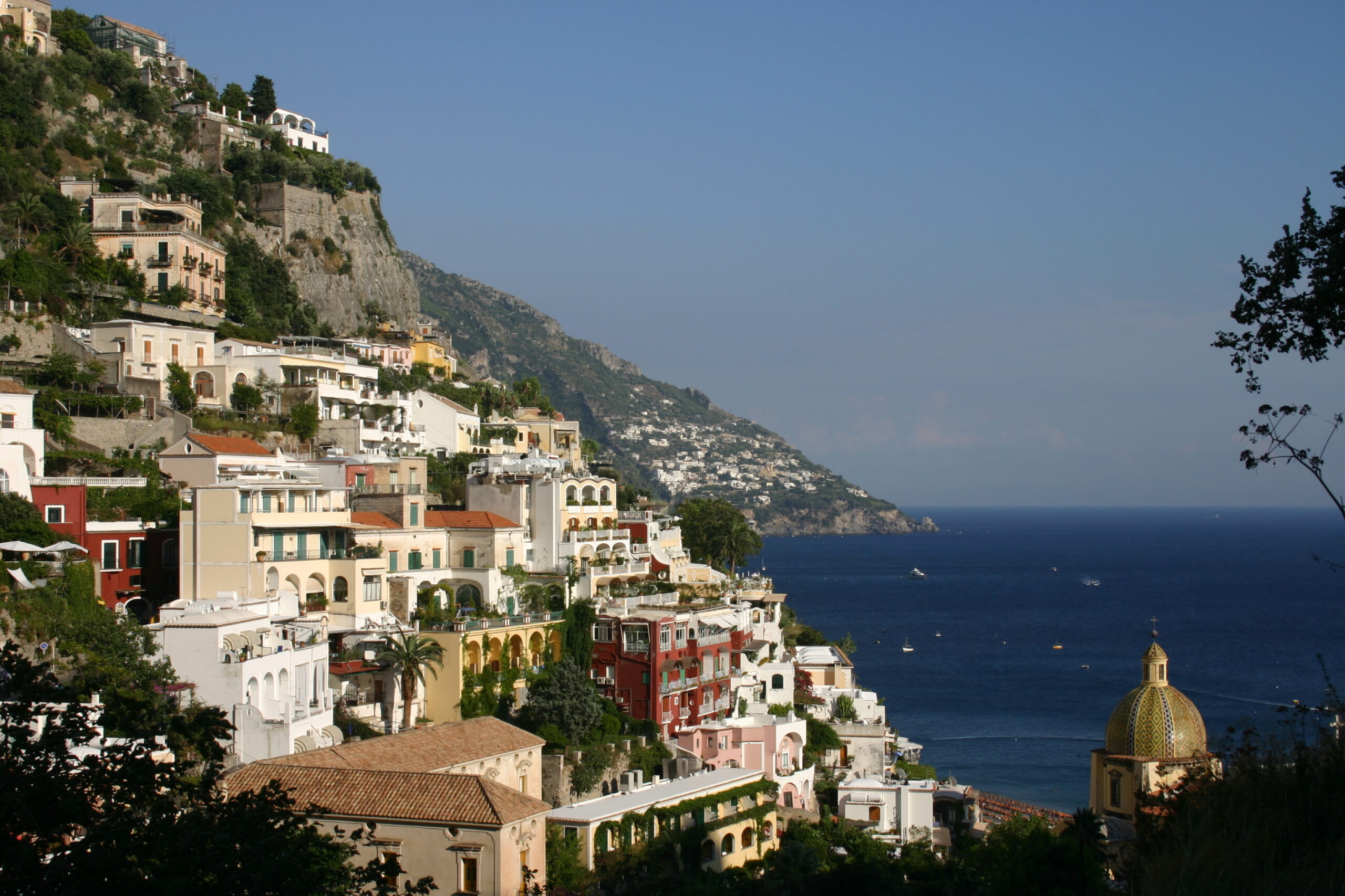 Positano, Italy, with colorful villas cascading down to the sea.