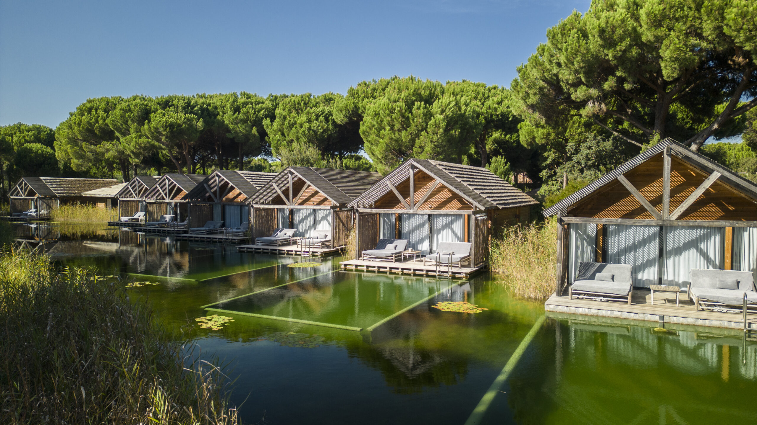 Luxury bungalows over tranquil water at Sublime Comporta
